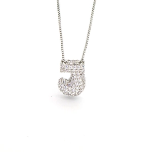Macro shot of silver number 5 pendant with white cubic zirconia and box chain