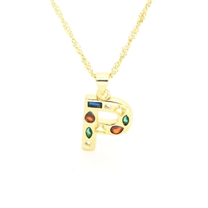 Detail of gold-plated letter P pendant with colorful zircon stones on a twist chain