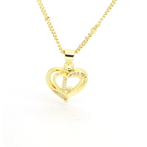 Detail of 18k gold heart necklace featuring a crystal letter L pendant on a fine chain