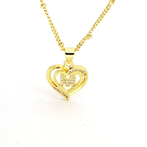 Detail of 18k gold-plated heart necklace with sparkling M letter pendant and dainty chain