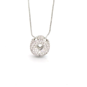Detailed macro view of silver cubic zirconia pavé setting on a donut-shaped pendant necklace