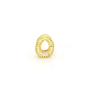 Detailed macro view of a gold-plated oval charm featuring micro-pave white zircon stones