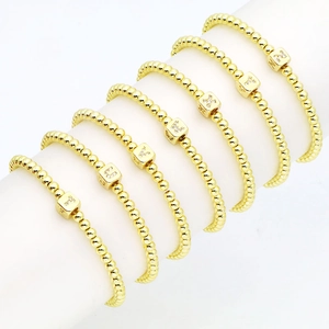 Vergoldete Perlenarmbänder mit quadratischen Buchstabenanhängern von T bis Z für Damen