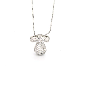Macro view of mushroom pendant featuring pave-set cubic zirconia on a silver box chain
