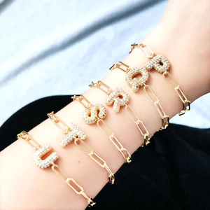 18k gold paperclip chain bracelets with zircon pavé bubble initial letters P to U