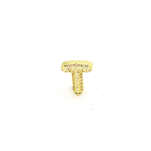 Detailed view of a gold-plated letter T charm encrusted with sparkling crystals