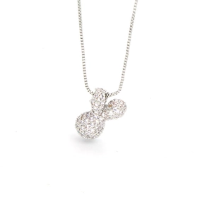 Detailed close-up of a silver-tone rabbit pendant necklace with sparkling cubic zirconia pavé