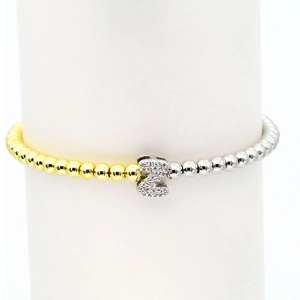 Detail of 18k gold plated beaded bracelet with micro-pave zircon letter Z charm
