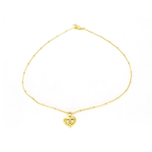 Close-up of 18k gold plated heart pendant necklace with letter A and zircon stones