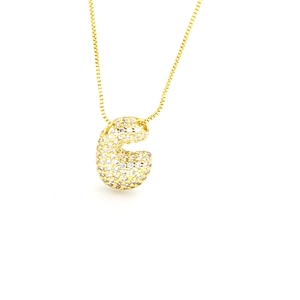 Detailed close-up of gold-plated letter G pendant necklace with cubic zirconia pave
