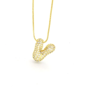 Detail of gold box chain and puffy letter V pendant with sparkling zircon micro-pave