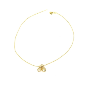 Detailed view of gold chain necklace with zircon-studded alphabet balloon pendant
