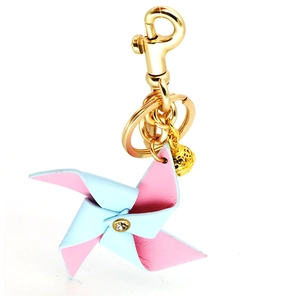 Porte-clés moulin à vent en cuir avec pétales rose bleu et pendentif clochette dorée