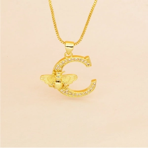 Gold letter C necklace with micro-pave zircons and 3D honey bee pendant on thin chain