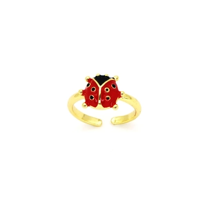 Macro shot of red enamel ladybug ring with gold finish and adjustable open band