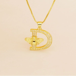 Gold-plated D letter necklace featuring a sparkling crystal bee pendant on a thin chain