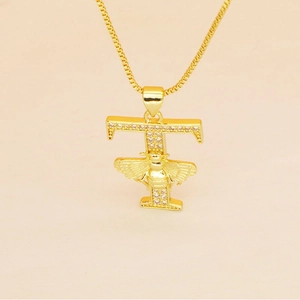 Macro view of gold letter F pendant with pave stones and detailed 3D bee accent