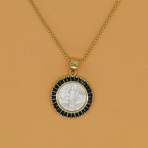 Golden round pendant necklace with blue zircon border and religious portrait engraving