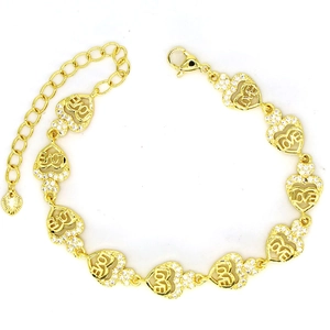 Golden heart link bracelet featuring hollow LOVE engraving and sparkling zircon stones