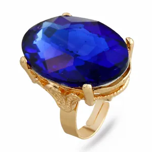 Anello d'oro alla moda con grande gemma blu ovale e fascia a onde regolabile
