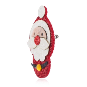 Macro detail of Santa Claus fabric brooch with sparkling glitter and metal pin back