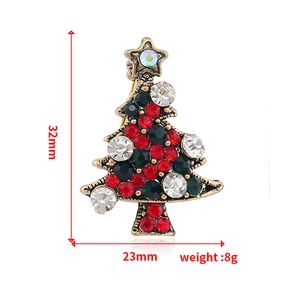 Detailed view of crystal Christmas tree brooch showing 32mm height and 23mm width