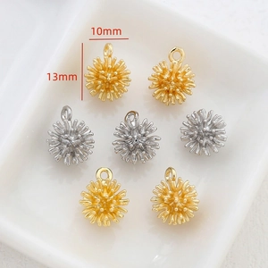 Macro shot of 10mm gold and silver bayberry ball pendants for DIY jewelry making