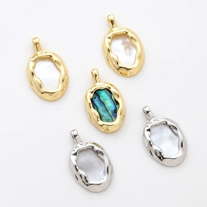 Detail of 14k gold-plated irregular oval pendants with shell inlays for DIY jewelry