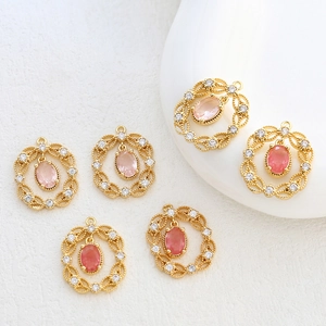 Pendenti circolari traforati placcati oro 14k con pietre rosa e zirconi bianchi lucidi