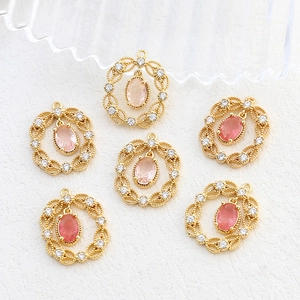 Set di ciondoli rotondi in oro 14k con pietre rosa e zirconi per la creazione di gioielli