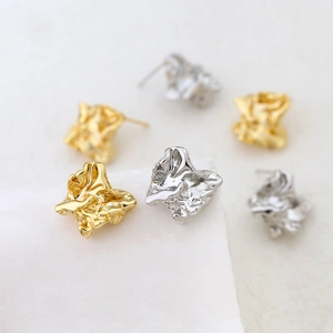 Irregular liquid metal stud earrings in gold and silver lava texture for DIY jewelry