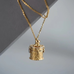 Golden waffle barrel necklace with bear pendant and engraved letter B for women