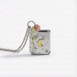 Vintage silver book locket necklace with rose and moon pattern in fairytale style