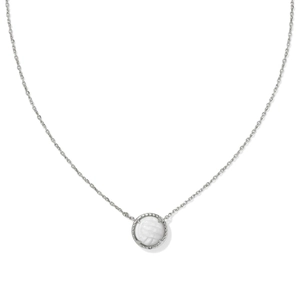 Close-up of silver chain necklace featuring a white basketball texture pendant with dotted edges