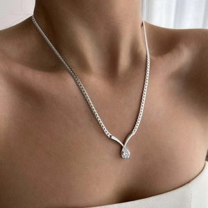 Silver titanium steel chain necklace featuring a pear-shaped cubic zirconia pendant