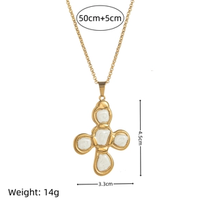 Gold titanium steel cross pendant necklace with white enamel inlay on a white background