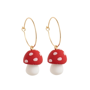 Creative handmade red mushroom earrings with gold hoops and white polka dots on white background