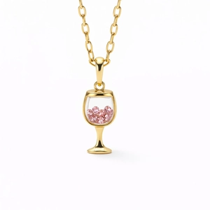 Detail of miniature wine glass pendant with pink crystals and gold plated chain