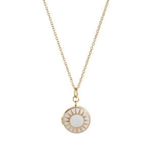 Detail of a golden locket necklace featuring a white sunburst enamel design and photo hinge