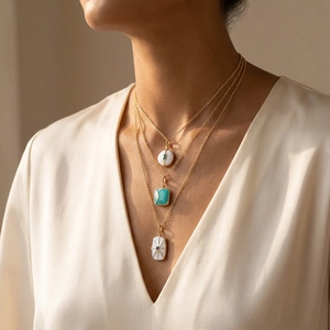 Three-layer bohemian gold necklace with colorful enamel and gemstone pendants