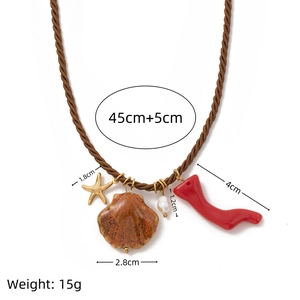 Ocean-themed starfish and shell pendant necklace with red coral charm and 45cm rope chain