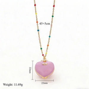 Gold star heart locket necklace with colorful beads and lavender enamel pendant