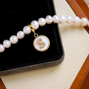 Gold plated alphabet S pendant with pearl necklace featuring shell inlay and zircon
