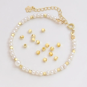 14K gold plated faceted beads bracelet with white pearls and delicate flower charm