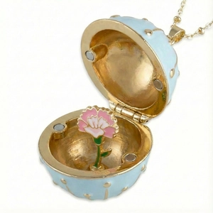 Light blue enamel egg locket pendant necklace with carnation flower design inside