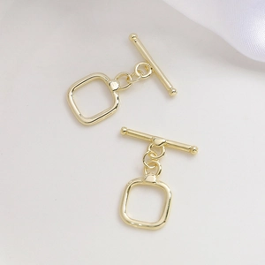 Close-up of square 14k gold plated OT toggles and T-bars for DIY jewelry making