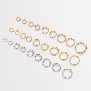 Assorted gold and silver plated jump rings in various sizes for DIY jewelry making