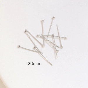 Detailed view of 20mm silver ball head pins for professional DIY jewelry making