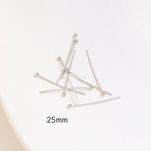 Detailed view of silver ball head pins 25mm length for DIY jewelry making and earrings