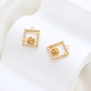 Macro shot of gold-plated rectangular rose pendant with micro-pave zirconia crystals